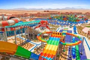 a water park with a roller coaster at Pickalbatros Jungle Aqua Park - Neverland Hurghada in Hurghada