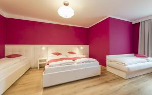 Postel nebo postele na pokoji v ubytování Hotel Lener