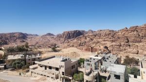 a view of a village in the mountains at Window on petra in Wadi Musa