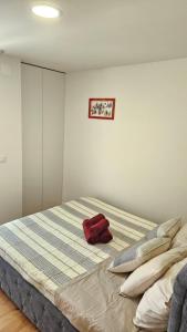 Postel nebo postele na pokoji v ubytování RED Apartments