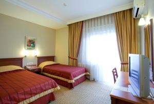 Postel nebo postele na pokoji v ubytování Sefa Hotel 2 Çorlu