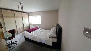 Postel nebo postele na pokoji v ubytování Homely Home