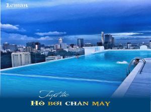 a swimming pool on the roof of a building at Léman Luxury Apartment District 3 HCMC in Ho Chi Minh City