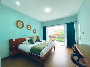 Postel nebo postele na pokoji v ubytování The Green Home Bali + 37 fotografií