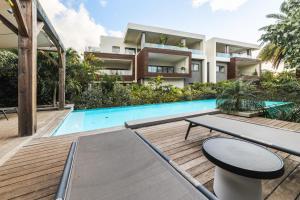 The swimming pool at or close to Modern Penthouse - Nautilya BS1