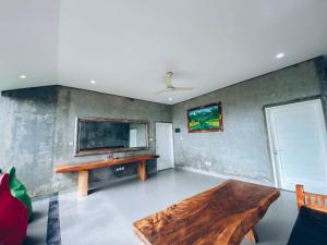 TV a/nebo společenská místnost v ubytování The Green Home Bali