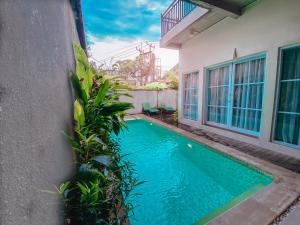 Bazén v ubytování The Green Home Bali nebo v jeho okolí
