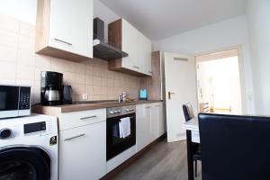 Η κουζίνα ή μικρή κουζίνα στο Apartment Centrum Bergisch Gladbach