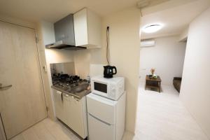 Kuchyň nebo kuchyňský kout v ubytování FL Residence Shinjuku II + 37 fotografií