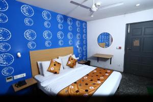 Rúm í herbergi á Hotel A4U sector 45 Gurgaon