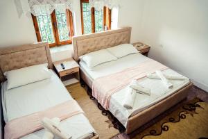 Postel nebo postele na pokoji v ubytování Guesthouse Arber + 37 fotografií