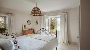 Voodi või voodid majutusasutuse Tyddyn Llwydyn toas