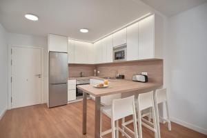 Kuchyň nebo kuchyňský kout v ubytování Mary Sánchez Beach Apartments