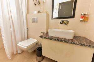 Baðherbergi á Hotel A4U sector 45 Gurgaon