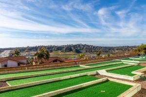 a row of green lawns on top of a building at Vacation Oasis! Ocean Views~Mini Golf~King-Suites in Solana Beach