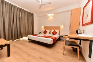 Rúm í herbergi á Hotel A4U sector 45 Gurgaon