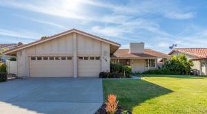 a large house with a garage in a yard at Vacation Oasis! Ocean Views~Mini Golf~King-Suites in Solana Beach