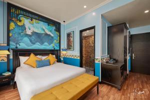 Postel nebo postele na pokoji v ubytování Eliana Signature Hanoi Hotel