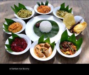 a group of plates of food on a table at AMRON RESORT SIGIRIYA in Sigiriya +51 photos