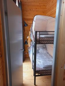 Postel nebo postele na pokoji v ubytování Vue exceptionnelle et sauna à 1h de Toulouse.