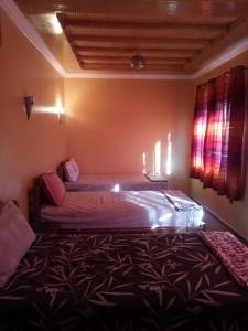 Rúm í herbergi á gite rurale Sousse paradis Vallée