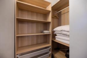 Łóżko lub łóżka w pokoju w obiekcie AtHome Toruń Apartamenty