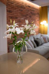 Część wypoczynkowa w obiekcie AtHome Toruń Apartamenty