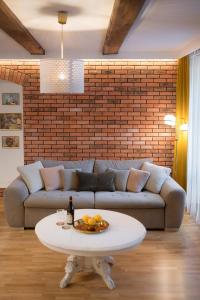 Część wypoczynkowa w obiekcie AtHome Toruń Apartamenty