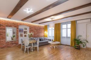 Część wypoczynkowa w obiekcie AtHome Toruń Apartamenty