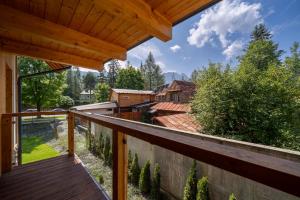 a view from the balcony of a house at RentPlanet - Luksusowe apartamenty Goszczyńskiego in Zakopane