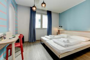 Postel nebo postele na pokoji v ubytování MEININGER Venezia Mestre