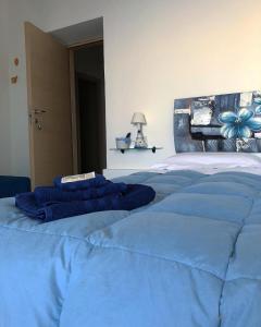 מיטה או מיטות בחדר ב-B&B Sa Clarera