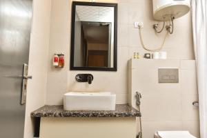 Baðherbergi á Hotel A4U sector 45 Gurgaon