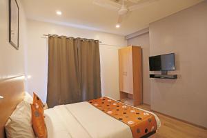 Sjónvarps- og/eða afþreyingartæki á Hotel A4U sector 45 Gurgaon