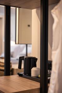 a coffee maker sitting on top of a counter at Erato by Samian Mare in Karlovasi