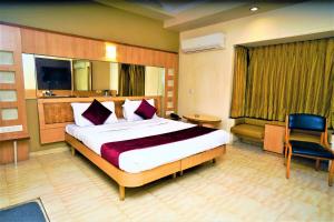 Postel nebo postele na pokoji v ubytování New Hotel Europa Inn