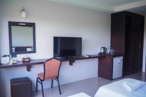 TV a/nebo společenská místnost v ubytování Rakkawan Residence