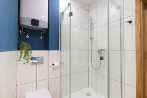 Łazienka w obiekcie AtHome Toruń Apartamenty