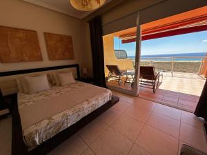 モロ・デル・ハブレにあるTerrazas de Jandíaのベッドルーム1室(ベッド1台付)が備わります。