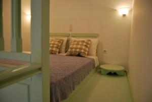 Ένα ή περισσότερα κρεβάτια σε δωμάτιο στο Lefkanthemo