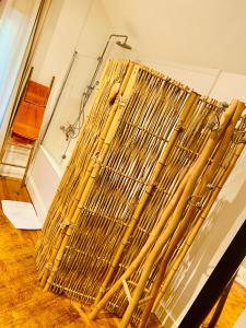 a large wooden rack sitting on the floor in a room at Hôtel VCB Ciney Centre-ville in Ciney