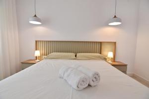 Postel nebo postele na pokoji v ubytování Villa Montgo