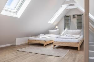 Voodi või voodid majutusasutuse fewo1846 - Goode Utsicht - zentral gelegene Maisonettewohnung mit einem Schlafzimmer toas