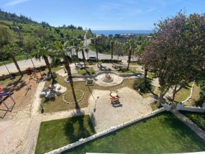 an aerial view of a park with a fountain at Willa Alanya in Kargicak