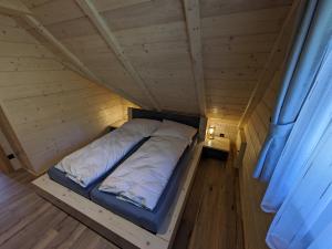 Vuode tai vuoteita majoituspaikassa Wellness Chalet Kohútka