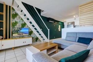 Posezení v ubytování Plein la vue - T4 Saint Leu 1ère ligne Pieds dans l'eau