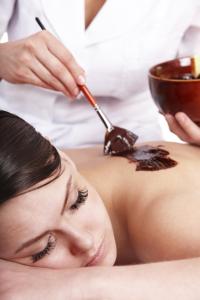 a woman in a spa getting her hair brushed at Bernardus Lodge & Spa in Carmel Valley