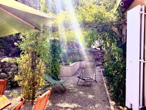 Ein Garten an der Unterkunft Corse Piana villa d’architecte vue exceptionnelle