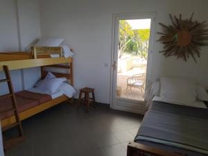 Ein Bett oder Betten in einem Zimmer der Unterkunft Corse Piana villa d’architecte vue exceptionnelle