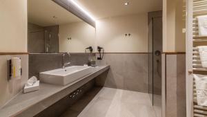 Kúpeľňa v ubytovaní Romantik Hotel Santer